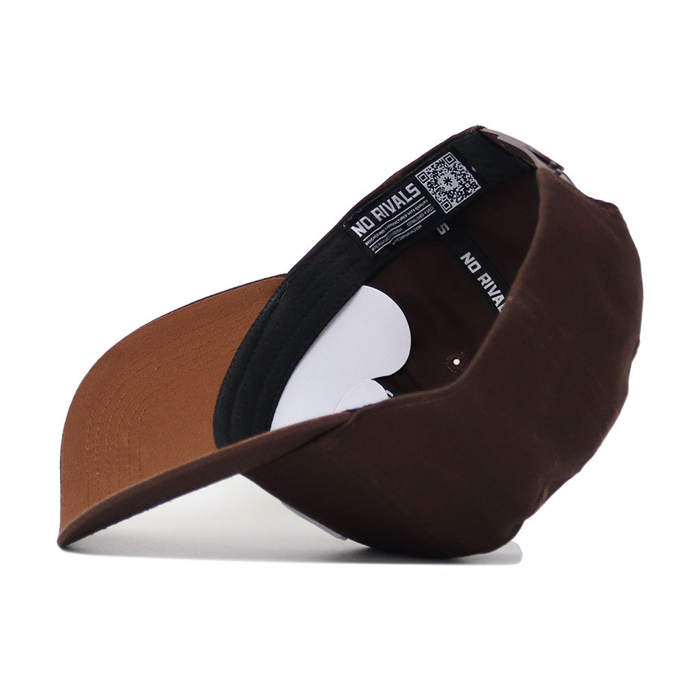 The Oklahoma Americano Hat, made from high-quality cotton, is shown upside down to reveal interior details like a black sweatband with "NO RIVALS" text, a QR code, structured fit, and brown underside of the brim.