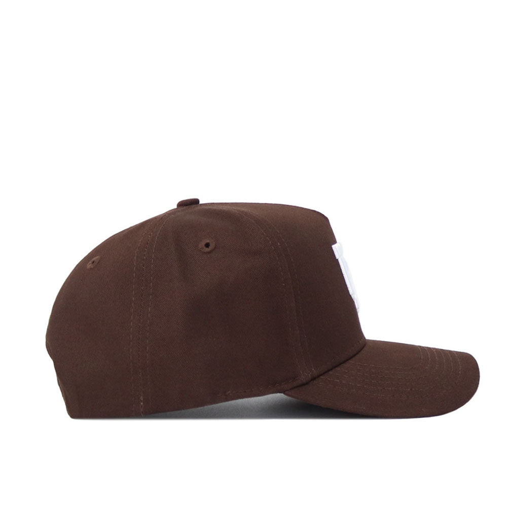 The Utah Americano Hat is displayed in a side profile, highlighting its brown color, structured fit, curved brim, and premium cotton construction. From this angle, the snap back design looks plain with no visible logos or designs.