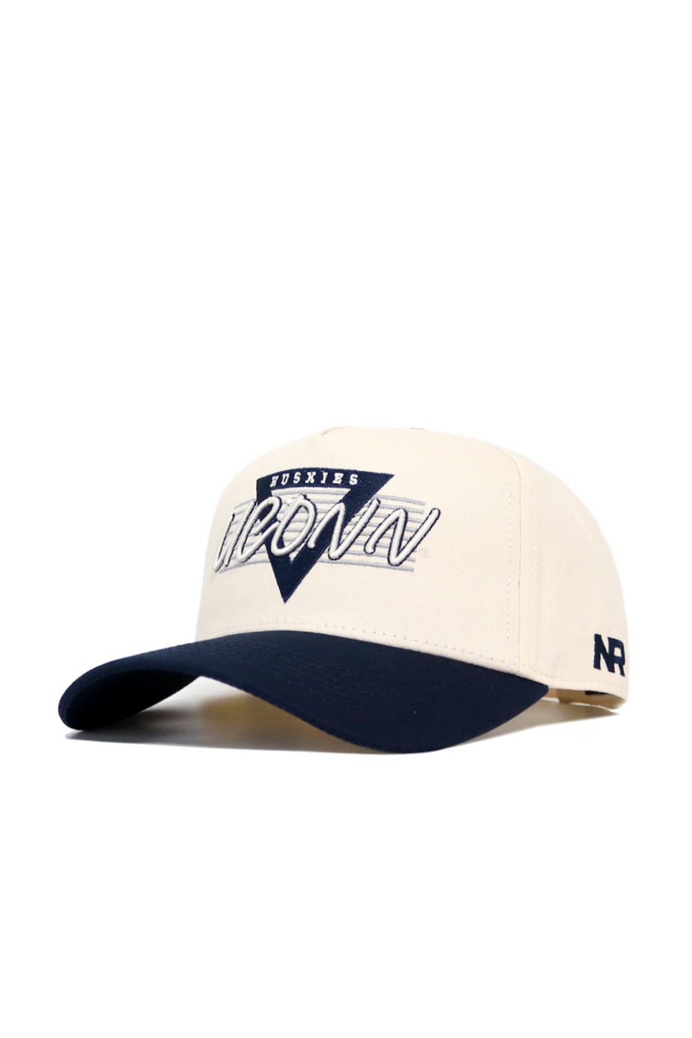The UConn Triangle Game Cap Hat features a cream crown with navy brim, high-quality cotton, a triangular Huskies/UConn front logo, and AR embroidered on the side. Its structured fit ensures lasting style.