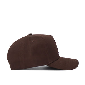 The App State Americano Hat, a brown cotton baseball cap with a curved brim and no visible logos or decorations, is shown from the side on a white background.