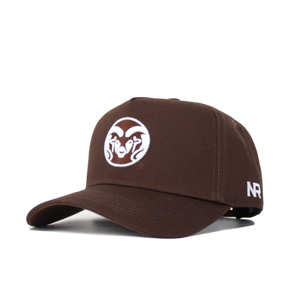 The Colorado State Americano Hat is a brown snapback with a curved brim, displaying a white embroidered ram head logo on the front and white NR on the side. Made from high-quality cotton, it offers a structured fit for comfort and style.