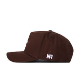 A brown USC Trojans Americano Hat with a flat brim and structured fit, shown from the side. "NR" is embroidered in white near the back of this high-quality cotton snapback cap.