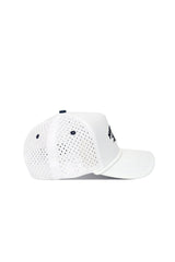The Nevada Gameday Hat is a white snapback with perforated mesh back and side panels, shown from the side on a plain white background. It features a curved brim and ventilation holes—ideal for your gameday look.