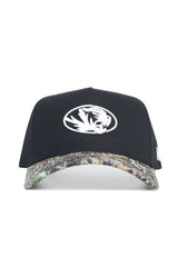 The No Rivals Mizzou Logo Camo Hat - Trailblazer Edition features a white embroidered tiger logo, camouflage brim, adjustable snap back, and is crafted from high-quality cotton for comfort.