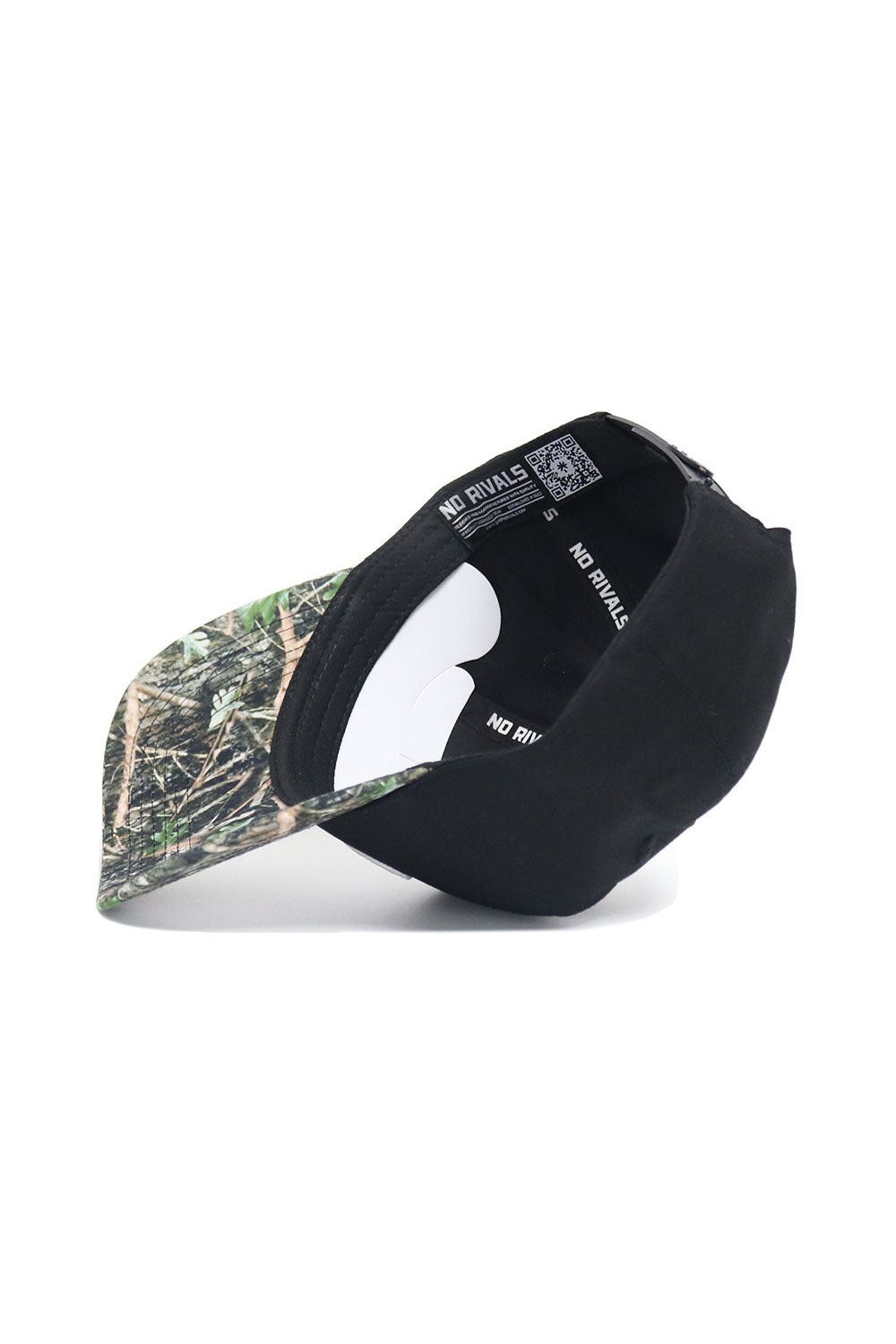 The Mizzou Logo Camo Hat - Trailblazer Edition by No Rivals is a black snapback cap shown upside down, displaying a camo-patterned brim and an interior NO RIVALS label. Made from high-quality cotton for comfort and style.