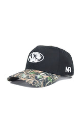 The No Rivals Mizzou Logo Camo Hat - Trailblazer Edition is a black cotton cap with a white embroidered tiger head, camouflage brim, snapback closure, and white "NR" letters on the side.