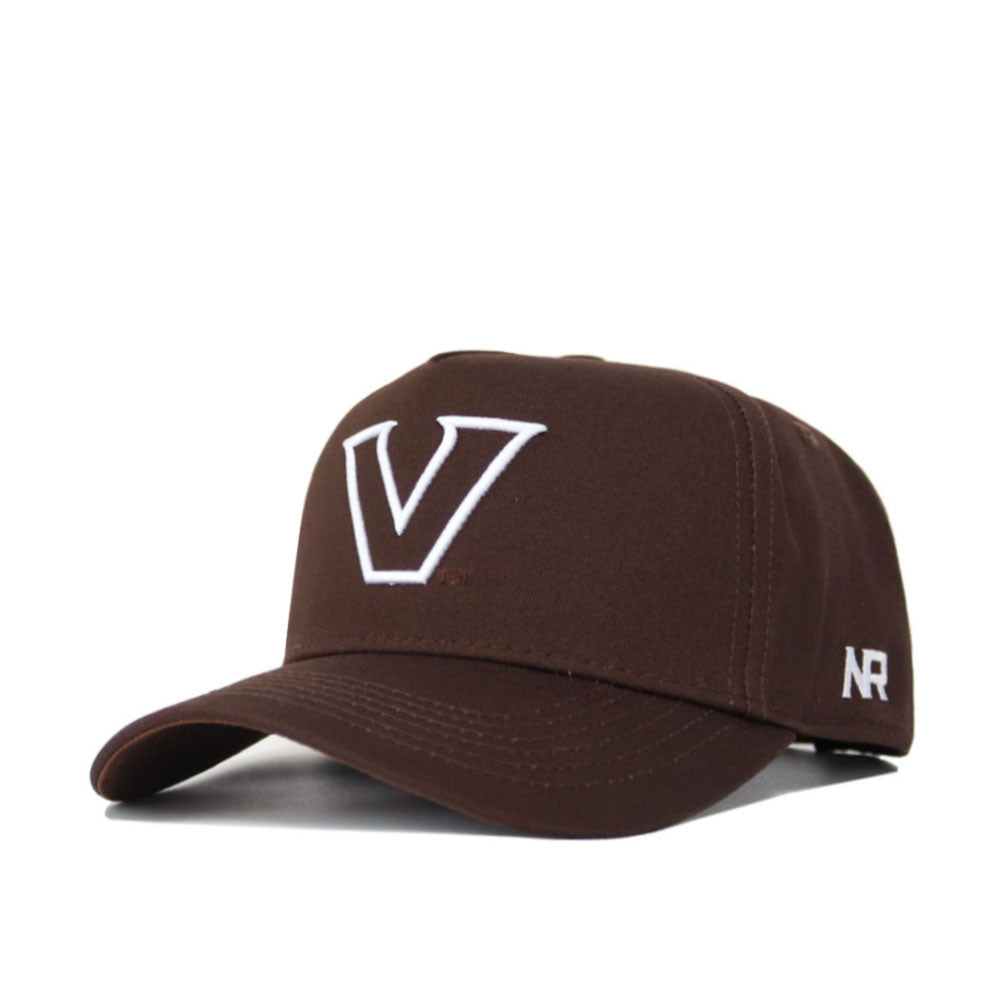 The Vanderbilt Americano Hat is a brown, structured baseball cap made from high-quality cotton, featuring a large white "V" on the front, "AR" embroidered on the side, and a classic snapback closure for comfort.