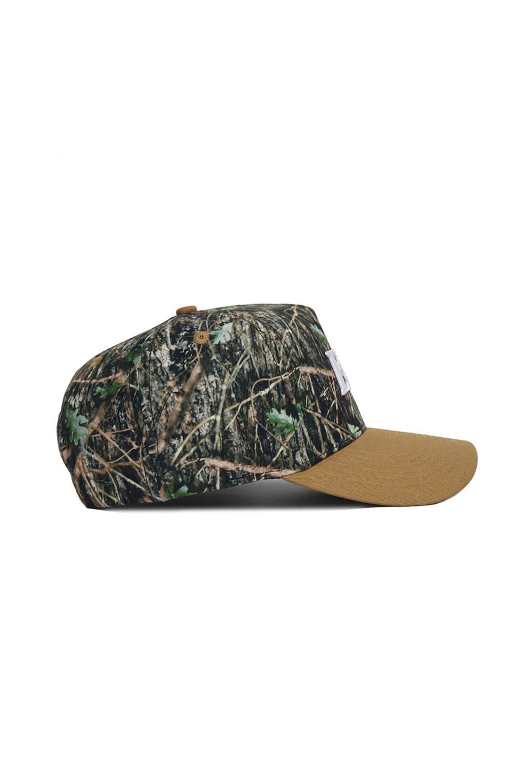 A side view of the No Rivals ECU Camo Hat - Explorer Edition, featuring a camouflage-patterned crown and solid brown brim in high quality cotton for a structured fit, shown against a white background.