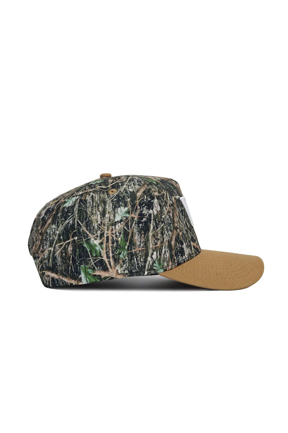 No Rivals Wake Forest Camo Hat - Explorer Edition shown in side view, features a camo crown and solid tan brim made from premium cotton, displayed against a white background.