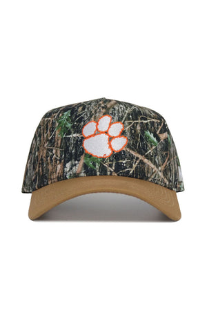 The No Rivals Clemson Camo Hat - Explorer Edition features a tan brim, orange-outlined white paw print logo, high-quality cotton construction, and an adjustable snap back for the perfect fit.