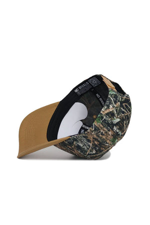 The Clemson Camo Hat - Explorer Edition by No Rivals is a high-quality cotton baseball cap with a brown brim and black inner lining featuring the NO RIVALS text. It includes a snap back adjustment for a perfect fit.