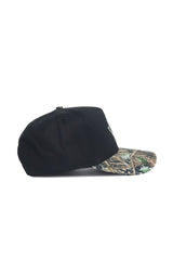 The No Rivals Tarleton State Camo Hat - Trailblazer Edition features a black snapback design with a camouflage brim, structured fit, and high-quality cotton. Displayed from the side against a white background.