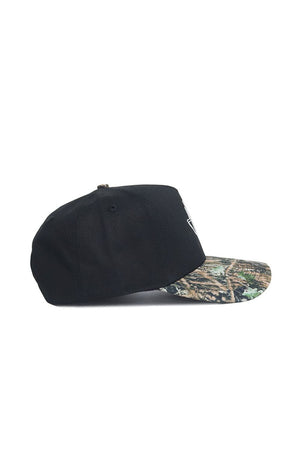 The No Rivals Tarleton State Camo Hat - Trailblazer Edition features a black snapback design with a camouflage brim, structured fit, and high-quality cotton. Displayed from the side against a white background.