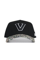 The No Rivals Vanderbilt Camo Hat - Trailblazer Edition is a black snapback cap with a large white V, camo-patterned brim, white side lettering, and crafted from high-quality cotton.