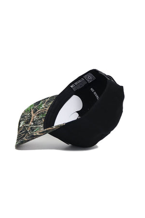The Vanderbilt Camo Hat - Trailblazer Edition by No Rivals features a black crown, camo brim, white inner padding, and “NO RIVALS” on the band. Made from high quality cotton for comfort and durability.