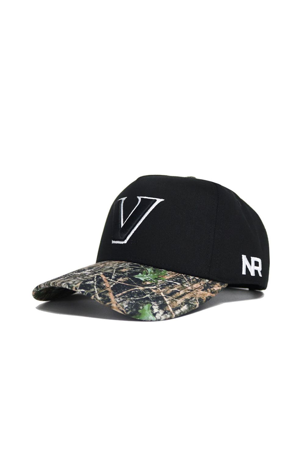 The Vanderbilt Camo Hat - Trailblazer Edition by No Rivals is a black snapback cap featuring a bold white V on the front, NR stitched on the side, and a camo-patterned brim. Made from high-quality cotton for comfort and style.