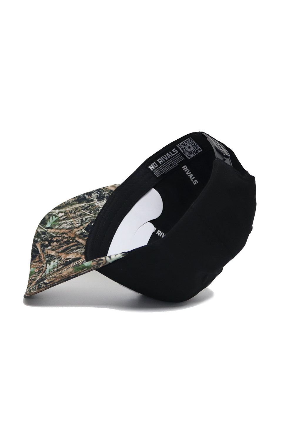 The K-State Camo Hat - Trailblazer Edition by No Rivals features a black, green, and brown camo curved brim, high-quality cotton construction, and NO RIVALS branding on the inner band.