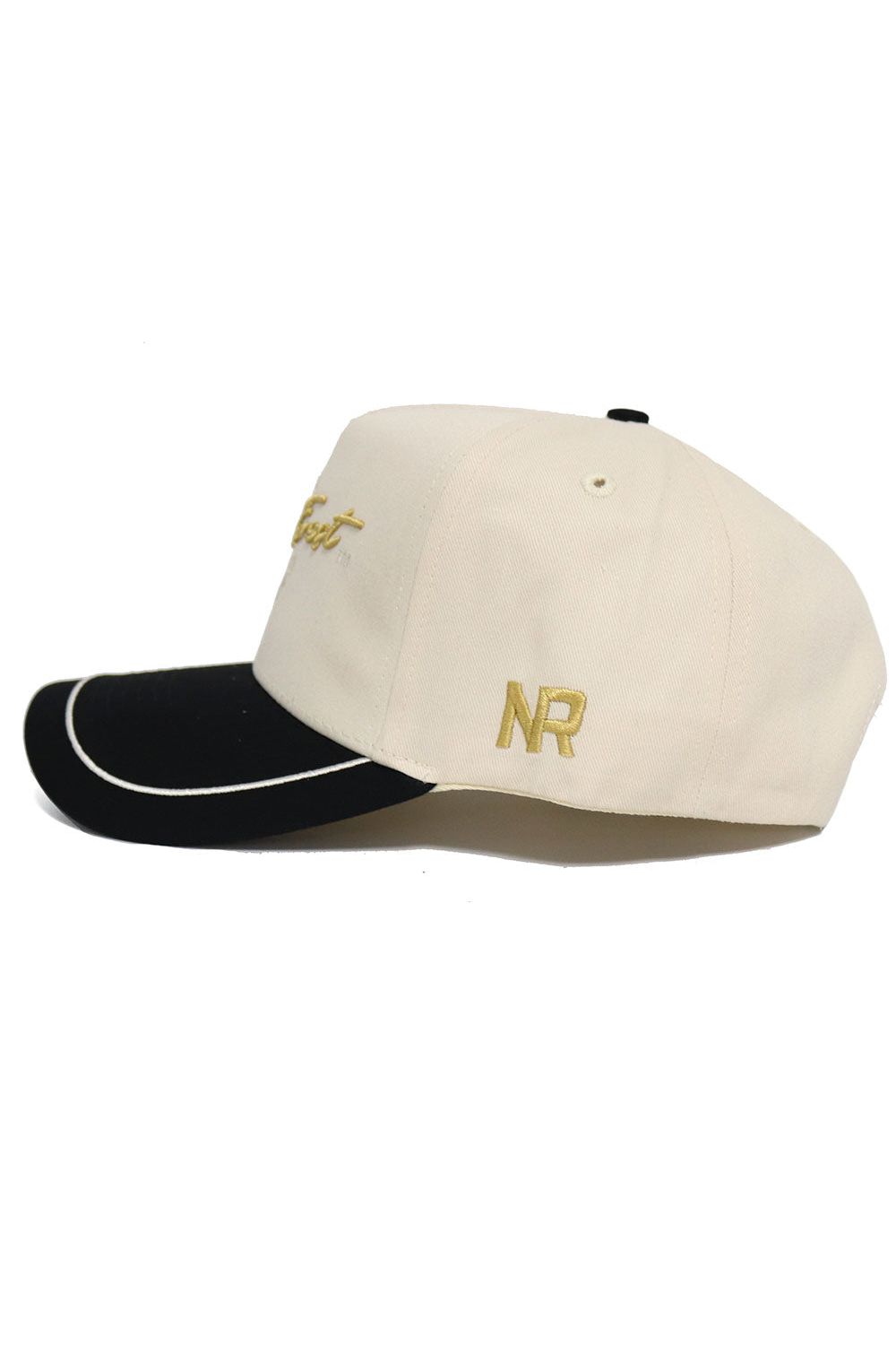 The Wake Forest ALOYO Hat by No Rivals is a beige cotton baseball cap with gold NR initials embroidered on the side, a black bill with a white edge accent, and an adjustable snap back for a custom fit.
