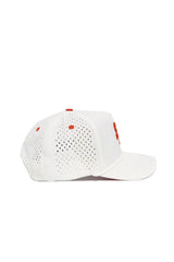 The Sam Houston State Gameday Hat is a white baseball cap with red accents, structured fit, and perforated side and back panels for ventilation. It features a snapback closure and is shown from a side angle on a plain white background.