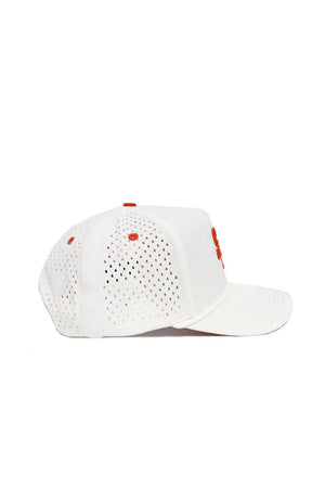 The Sam Houston State Gameday Hat is a white baseball cap with red accents, structured fit, and perforated side and back panels for ventilation. It features a snapback closure and is shown from a side angle on a plain white background.