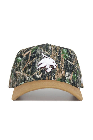 The No Rivals Texas State Camo Hat – Explorer Edition is a structured snapback with a tan brim and embroidered white bobcat head logo on the front, made from high-quality cotton.