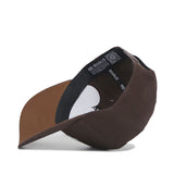 The Tulane Americano Hat, a brown snapback shown upside down, features a structured fit, black sweatband, “NO RIVALS” stitching, QR code tag, and a light brown cotton brim underside.