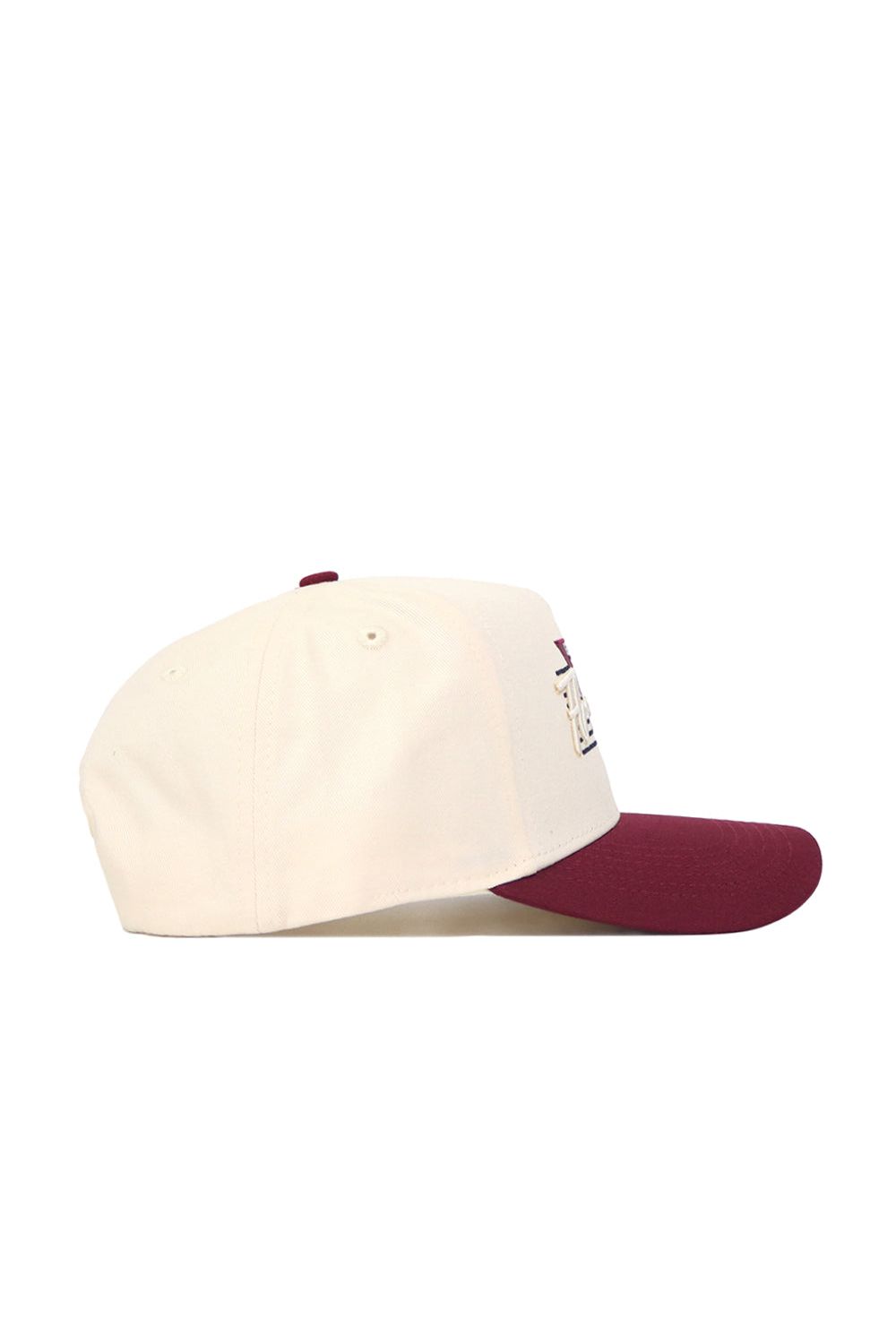 The Florida State Triangle Game Cap Hat is a cream-colored structured baseball cap with a maroon bill, embroidered front details, and ventilation holes, crafted from high-quality cotton and shown in profile.