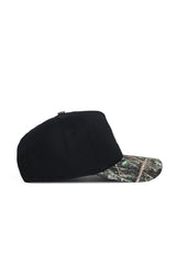 The No Rivals Texas State Camo Hat - Trailblazer Edition features a black crown with a camouflage brim, made from premium cotton and displayed in a side view on a white background.