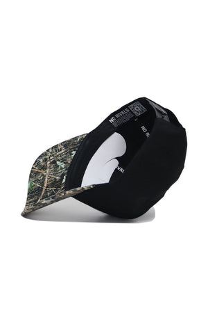 The No Rivals Kentucky Camo Hat - Trailblazer Edition is a structured black cotton cap featuring a camouflage-patterned brim. Shown upside down, the photo highlights its inner lining and labels, showcasing classic style and durability.