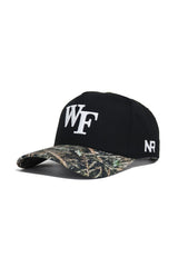 The Wake Forest Camo Hat - Trailblazer Edition by No Rivals is a black snapback with white WF embroidery on the front, NR on the side, a structured fit, high-quality cotton material, and a green/brown camo brim.