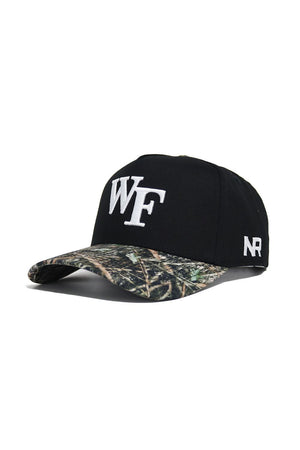 The Wake Forest Camo Hat - Trailblazer Edition by No Rivals is a black snapback with white WF embroidery on the front, NR on the side, a structured fit, high-quality cotton material, and a green/brown camo brim.