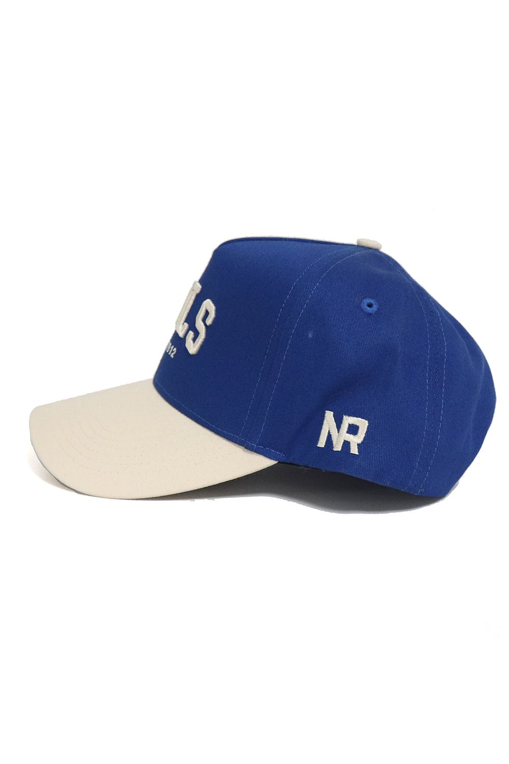 The OWLS Established Hat by No Rivals features a blue crown, beige brim, and white embroidered NR on the side with partial lettering on the front. It has a snap back closure for comfort and is shown on a white background—perfect for your gameday look.
