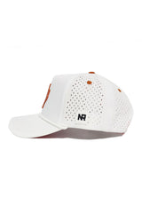 Side view of the State of Texas Gameday Hat by No Rivals—a white snapback featuring orange ventilation holes, an orange top button, and a small white patch with black "NR" lettering on the back; perfect for game day.