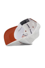 The State of Texas Gameday Hat by No Rivals is a white and burnt orange snapback with a perforated interior, polyester-cotton blend sweatband featuring NO RIVALS text, and a brim QR code—perfect for your gameday outfit.