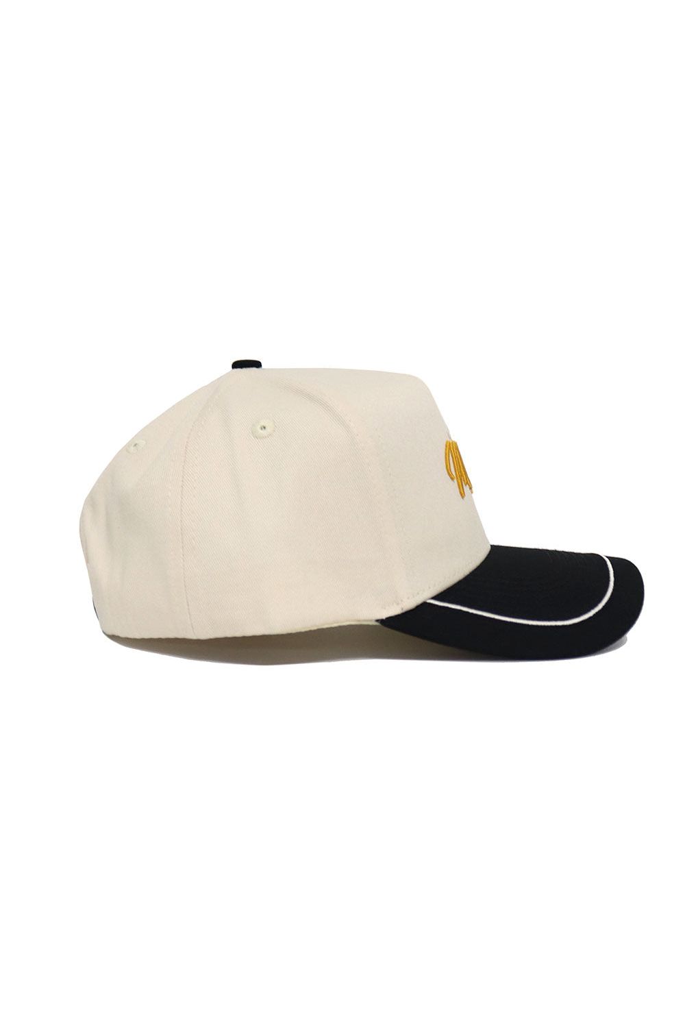 The No Rivals Mizzou Tigers ALOYO Hat is a cream baseball cap with a black brim and white accent line. Made of high-quality cotton, it features yellow embroidered lettering, ventilation eyelets, and an adjustable snapback for a comfortable fit.