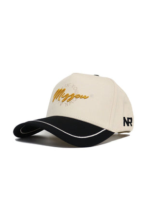 The No Rivals Mizzou Tigers ALOYO Hat features a beige and black cotton design, yellow "Missyou" embroidery on the front, black "NR" on the side, a curved black brim with white trim, and a snap back for adjustable fit.