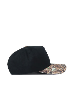 The No Rivals App State Camo Hat - Trailblazer Edition (B2B) is a black, flat-brim cotton cap with a brown and green camo pattern and snapback closure, shown from the side on a white background.