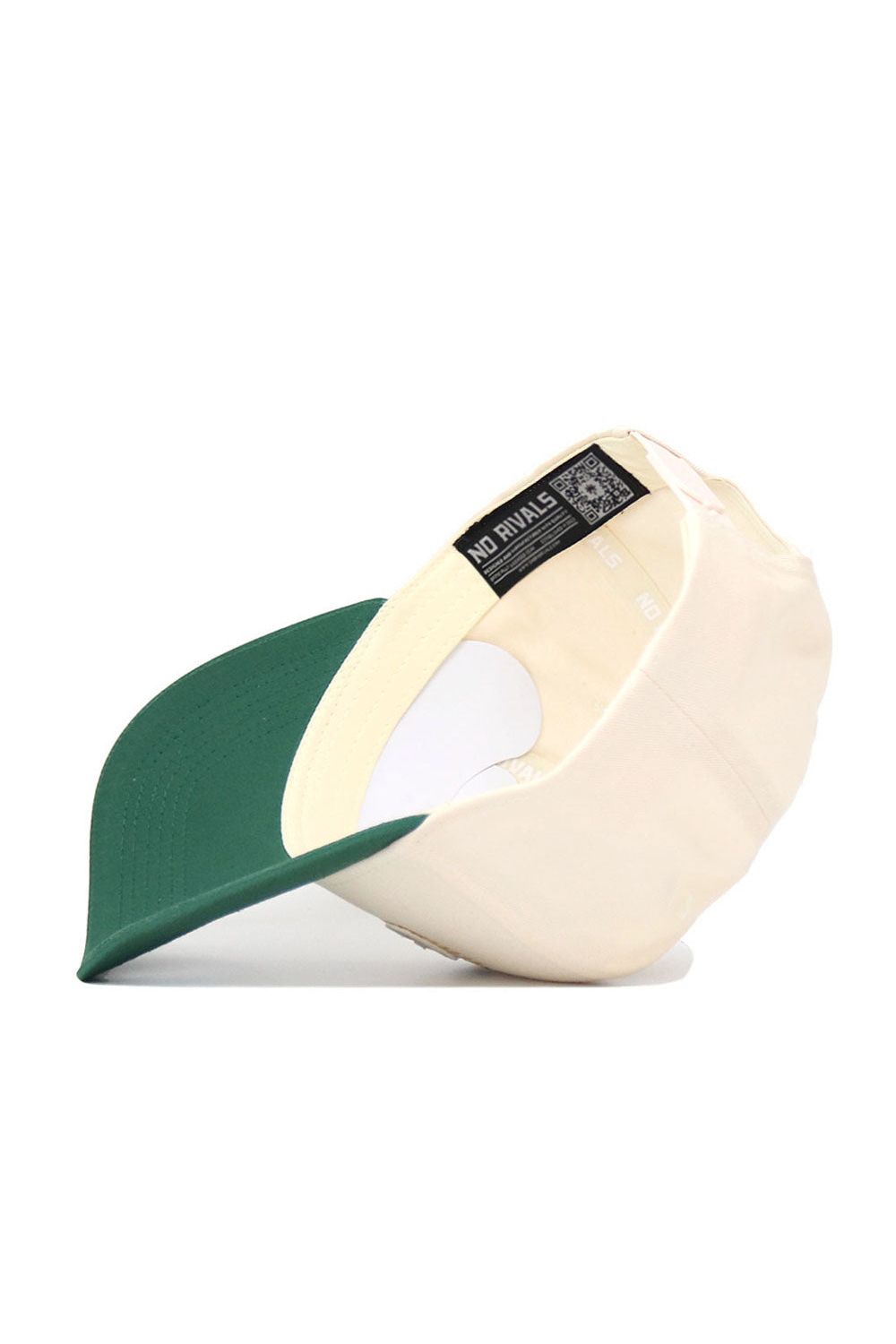 The UNC Charlotte Triangle Game Cap Hat by No Rivals features a cream snapback design with a green brim, shown from the inside. A black No Rivals label and QR code near the inner edge highlight its structured fit.