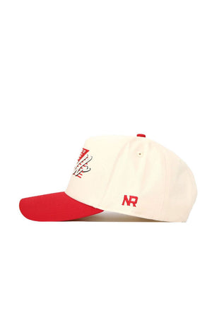 The Louisville Triangle Game Cap Hat by No Rivals is a cream baseball cap with a red brim and top button, “NR” embroidered in red on the side, a white and red front graphic, and an adjustable snapback for comfort.