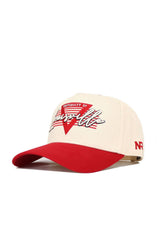 The Louisville Triangle Game Cap Hat by No Rivals is a cream cap with a red brim, featuring "University of Louisville" embroidered on the front, NR on the side, structured fit, and an officially licensed snapback design.