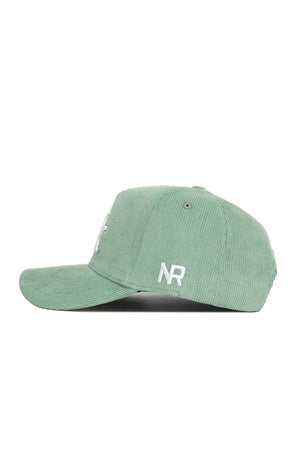 The No Rivals Kentucky Corduroy Hat - Structured - Spring Green (B2B) is shown in side view with white NR embroidery, a curved bill, visible stitching, and an adjustable snap back closure for comfort.