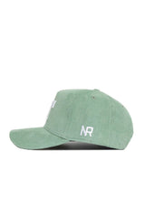 The No Rivals Tennessee Corduroy Hat - Structured in Spring Green is shown from the side, featuring white embroidered "NR" letters above the brim on a green snapback baseball cap.