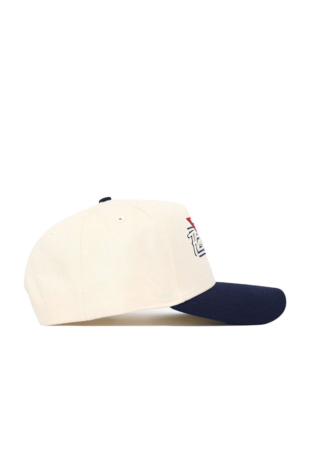 The No Rivals Florida Atlantic (FAU) Triangle Game Cap Hat is a cream snapback with a navy blue brim, structured fit, partial embroidered text, and a red front design, shown in side view.