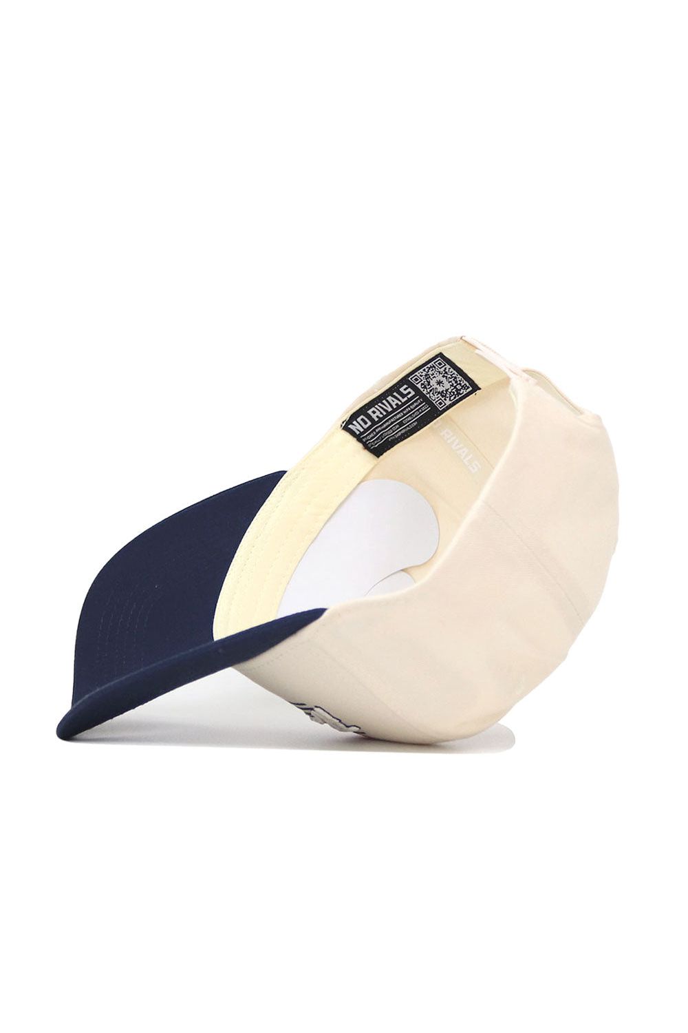 Inside view of the No Rivals Florida Atlantic (FAU) Triangle Game Cap Hat, featuring a navy blue bill, cream crown, structured fit, and visible interior tags and stitching.