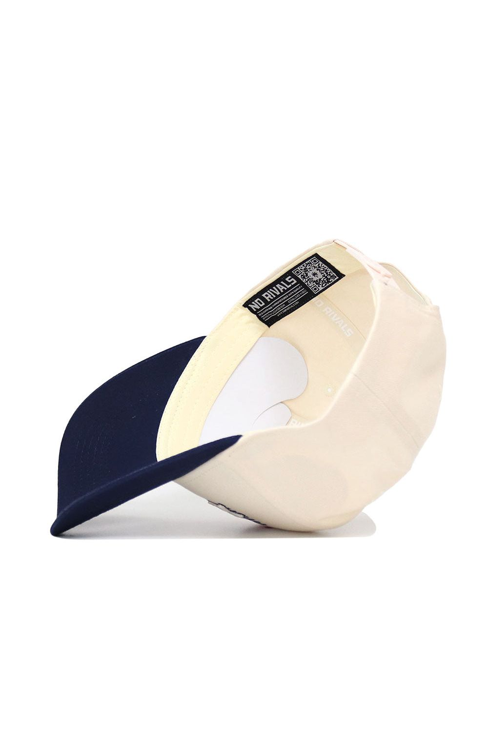 The No Rivals University of Arizona Triangle Game Cap Hat features a beige and navy blue structured fit, shown from an inside angle highlighting interior labels, stitching, and a QR code tag on the inner band.