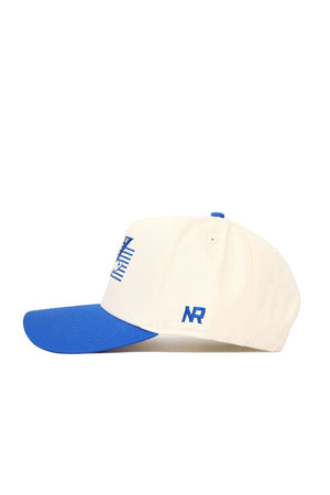 The No Rivals Tulsa Triangle Game Cap Hat is a white snapback with a blue brim, top button, and side NR embroidery. A bold blue graphic stands out on the front. This officially licensed structured fit cap is shown from the left.