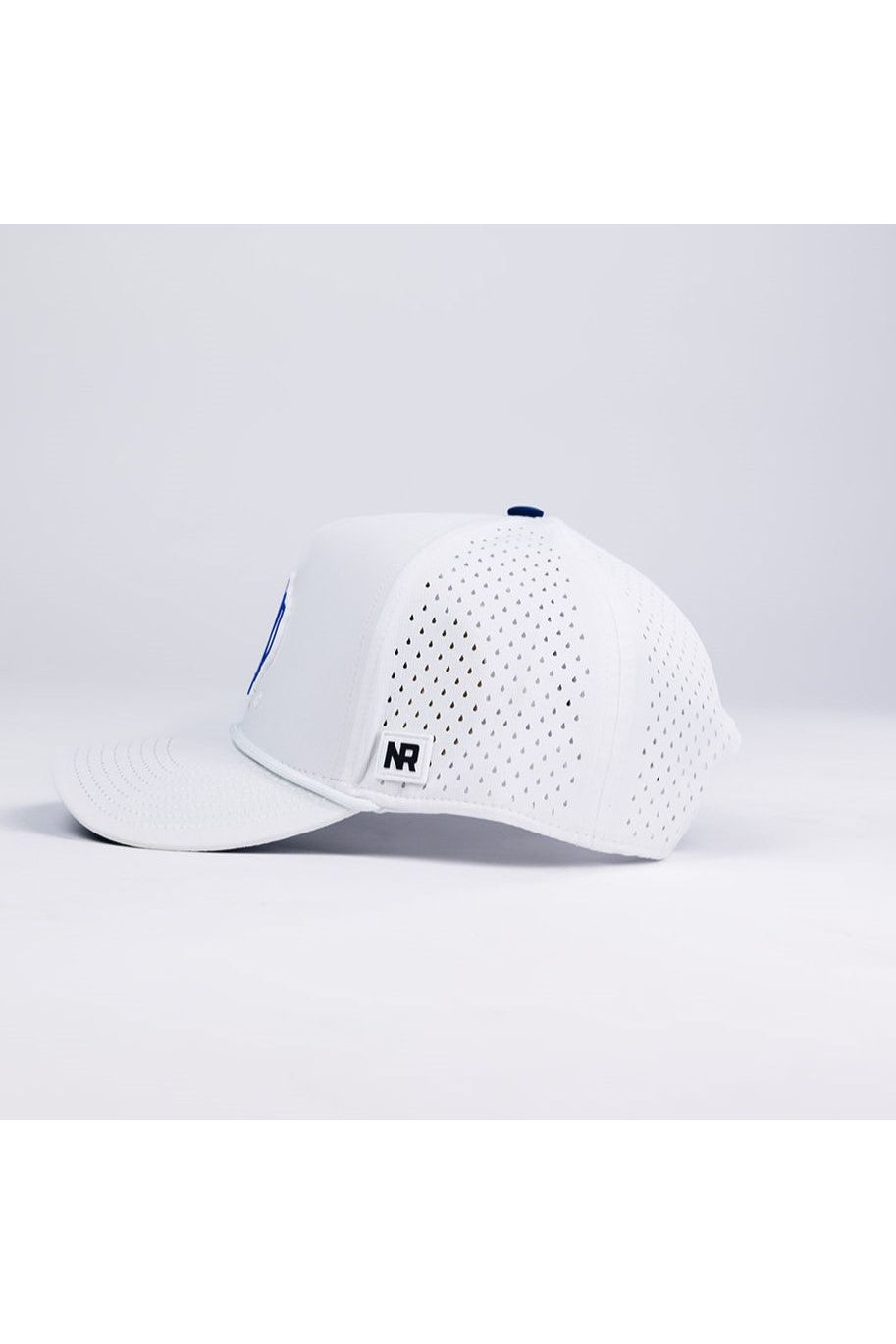The Rice Gameday Hat by No Rivals is a white snapback baseball cap with side and back ventilation holes, a flat brim, and an NR logo tag—ideal for your gameday fit. Side view shown.