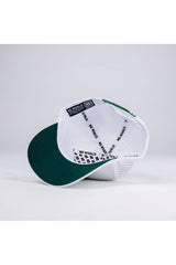 The Baylor Gameday Hat by No Rivals is shown upside down, revealing its inner rim with repeated NO RIVALS text and black-and-white stitching. It features a snapback adjustment for fit. The background is plain light gray.