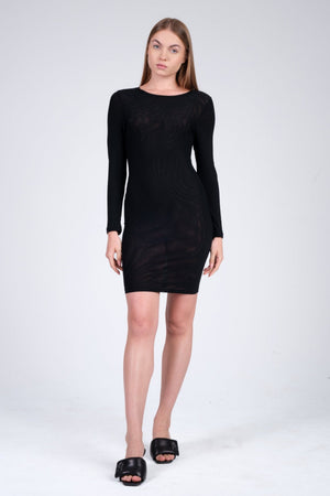 Woman wearing a black dress on a white background