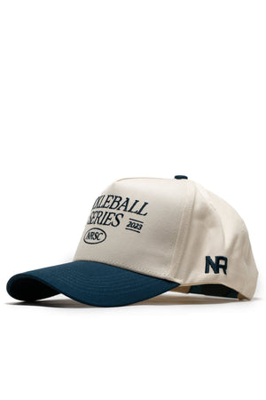 The Old School Pickleball Hat - Classic Blue by No Rivals features a cream crown, navy blue brim, and high-quality cotton. "SOLEBALL SERIES 2023 NRSC" is on the front, with NR initials embroidered in navy for a structured fit.